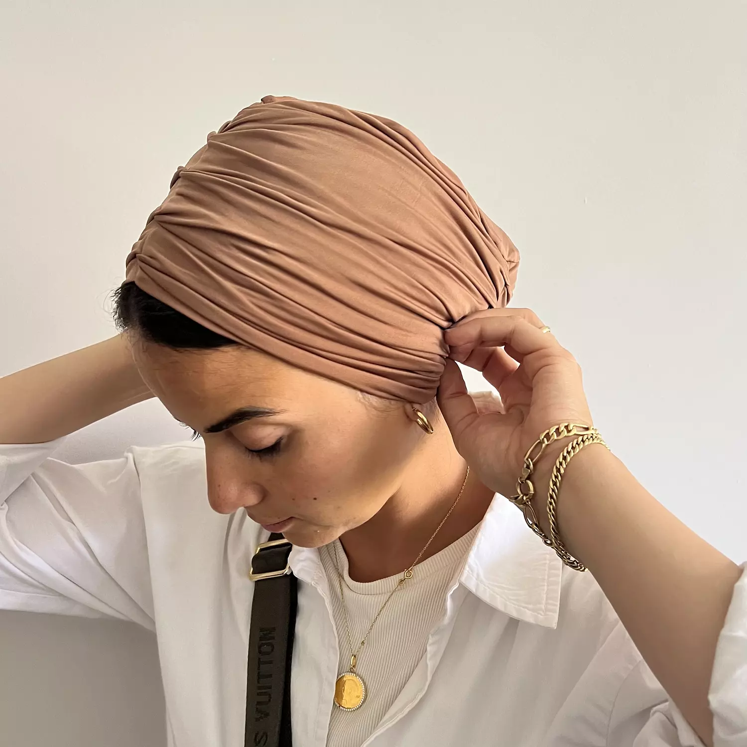 The golden cafe Turban  hover image