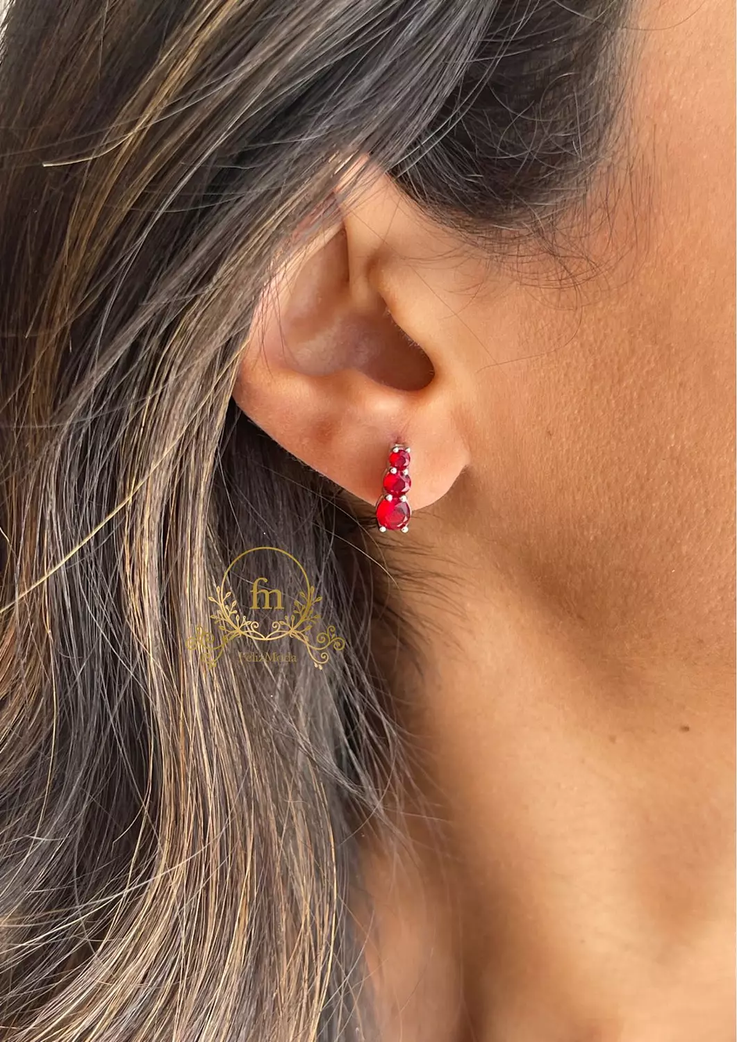 Three red stones silver earrings hover image